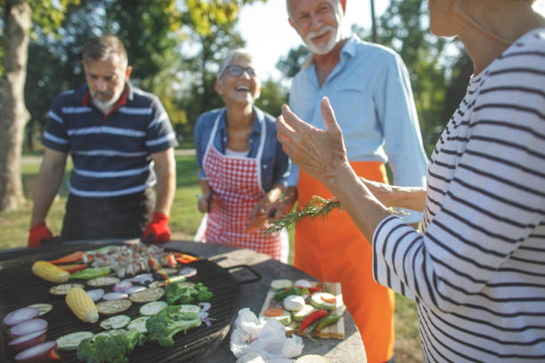 istock Senior people having a picnic 1045989700