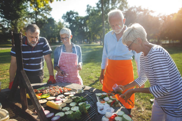 istock Senior people having a picnic 1045989760
