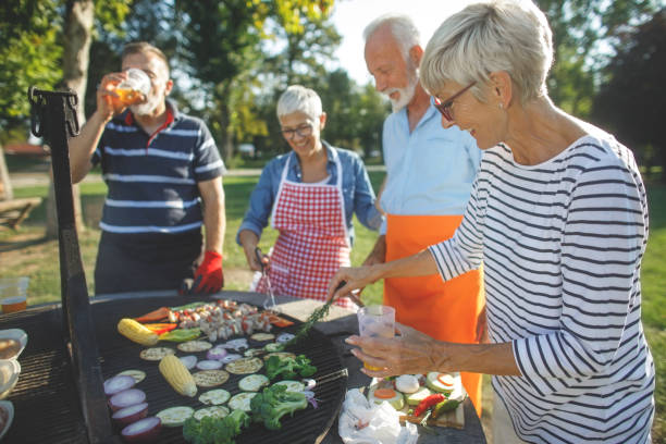 istock Senior people having a picnic 1045989762