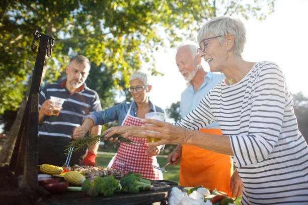 istock Senior people having a picnic 1045989792