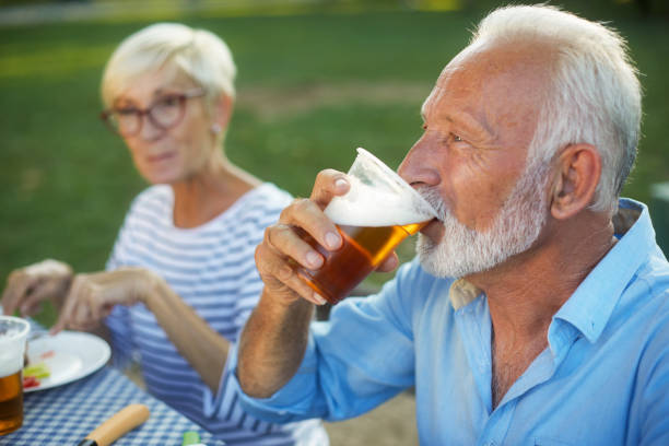 istock Senior people having a picnic 1045990578
