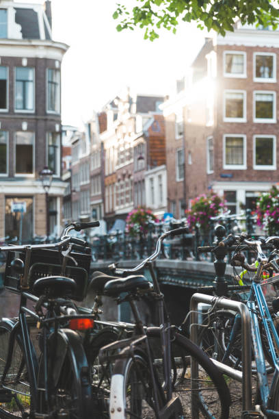 istock Bicycles lining a bridge over the canals of Amsterdam, Netherlands 1046009414