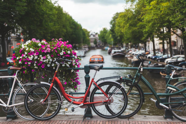 istock Bicycles lining a bridge over the canals of Amsterdam, Netherlands 1046009990