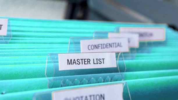 istock Business file of master list document record 1046010126