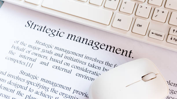 istock Strategic management wording on office area space. 1046010218