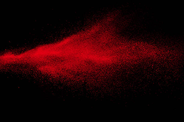 istock Red color powder explosion on black background. 1046030500
