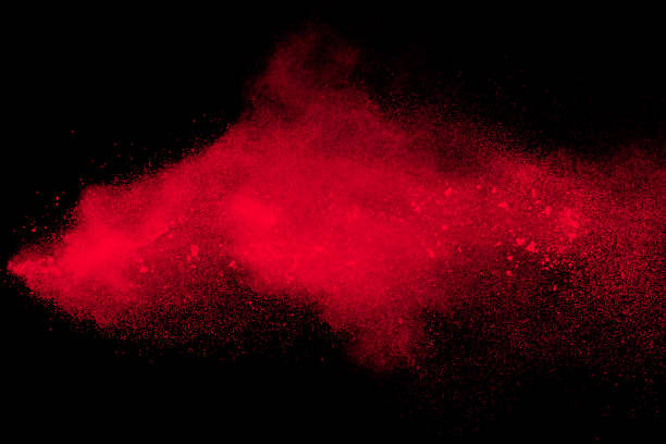 istock Red color powder explosion on black background. 1046030598