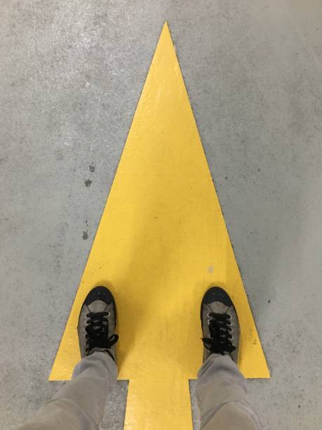 istock Yellow arrow on the floor 1046030850