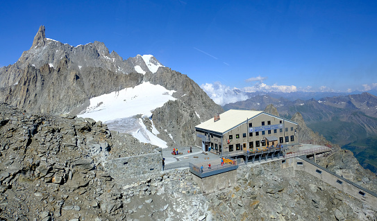 Courmayeur, Italy - August 10, 2018: The Torino Hut operates as a mountain refuge connected to Point Helbronner through the rock of the mountain, with horizontal tunnel and a vertical lift
