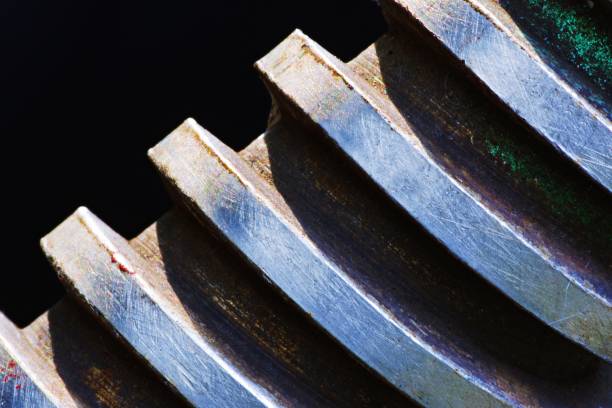 istock Closed up part of screw (black background) 1046030920
