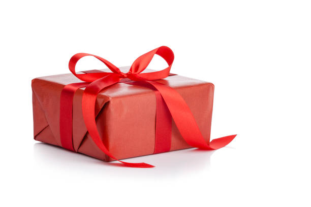 istock Red gift box with red ribbon isolated on white background 1046039096