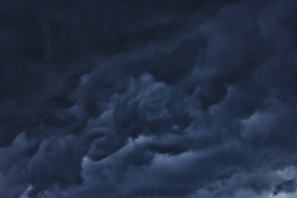 istock Gloomy dark cloudy sky before the thunderstorm 1046045510