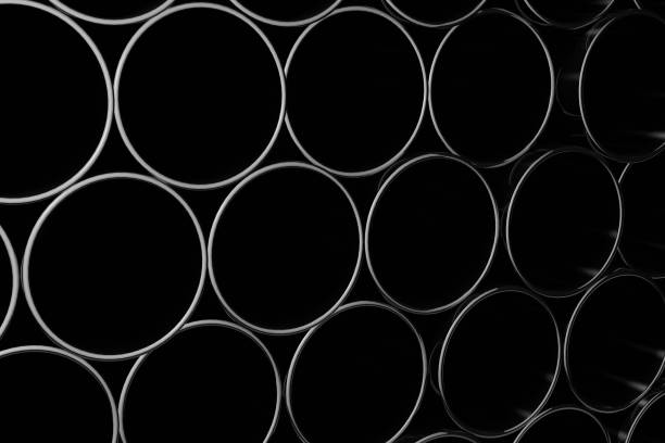 istock Stack of shiny metal steel pipes 1046046576