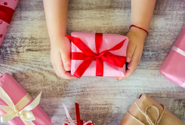 istock Gifts for the holiday in a beautiful package. Selective focus. 1046057076