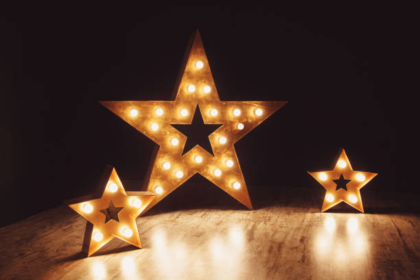 istock Three stars of light bulbs. 1046059850