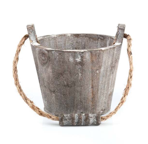 istock Medieval Style Wooden Bucket with a Rope Handle on white background 1046068622