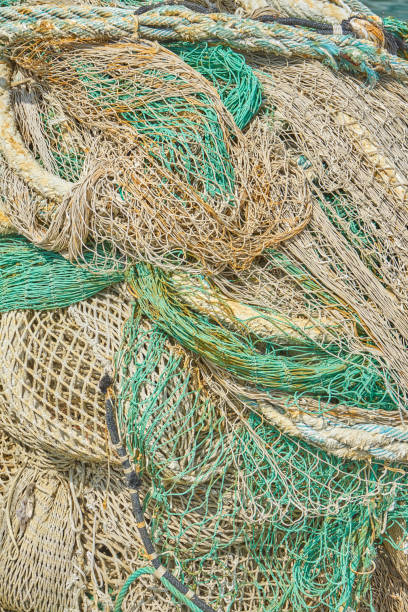 istock Texture Of Green And White Fishnets 1046074772