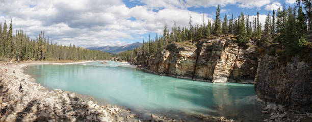 istock Lower River at Athabasca Falls in Jasper National Park, Canada. 1046080670