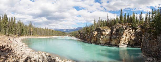 istock Lower River at Athabasca Falls in Jasper National Park, Canada. 1046080840