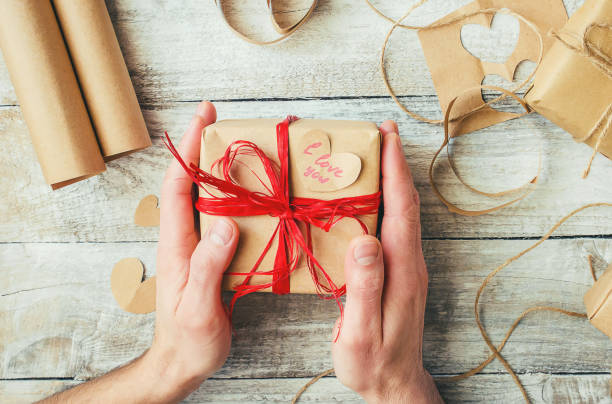 Gift wrapping for the beloved. Selective focus.
