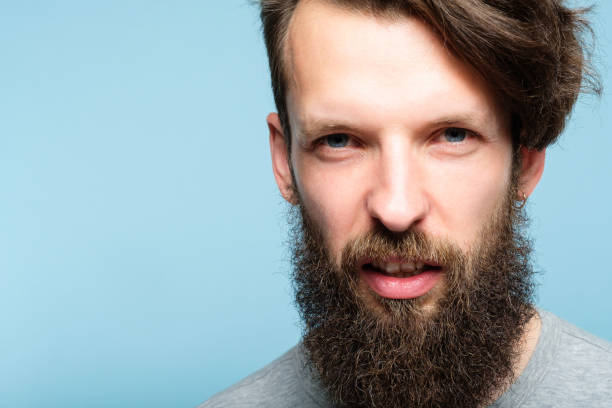 istock scornful disdainful disrespectful look man emotion 1046086304
