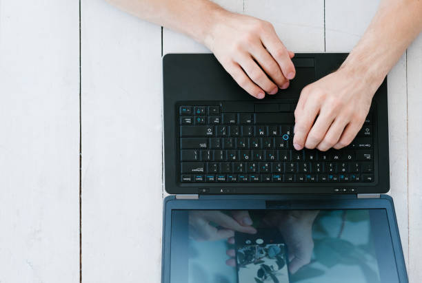 istock blogger social media man laptop hands keyboard 1046086490