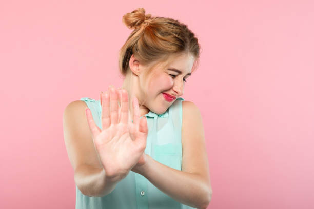 istock rejection refusal see woman put hands push away 1046086914