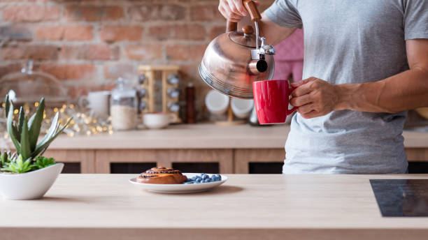 istock food breakfast morning meal kitchen man kettle mug 1046086994