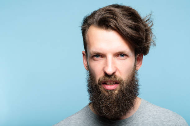 istock scornful disdainful arrogant look haughty man 1046087208
