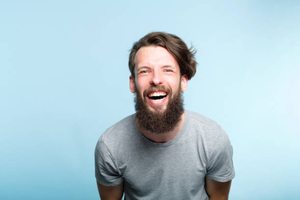 istock happiness enjoyment laugh bearded man expression 1046087278