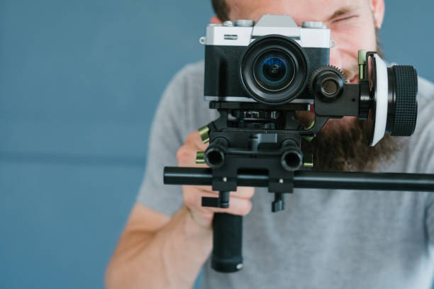 istock video content creation man camera shooting footage 1046087386