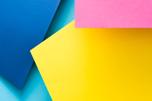 istock paper collage background yellow blue pink layers 1046088186