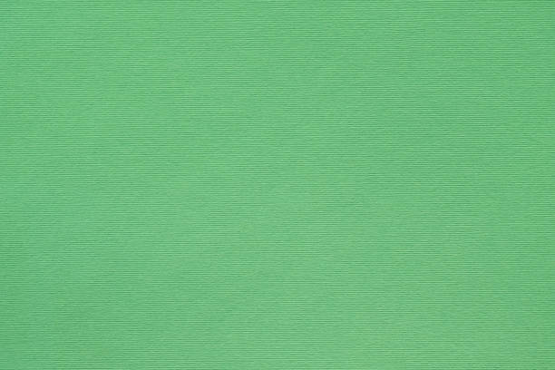 istock green paper texture background fibers grain empty 1046088214