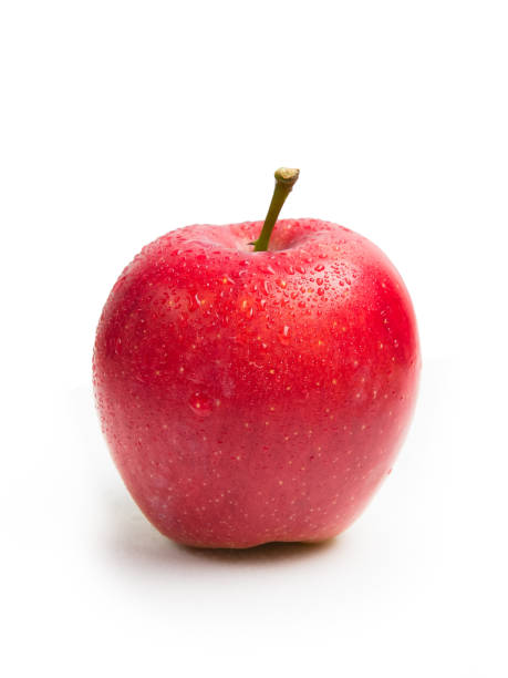 istock Wet red apple isolated on white background. 1046133834