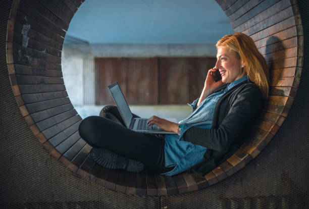 istock Woman working outdoors 1046139046