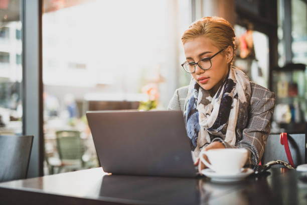 istock Young Asian woman working in restaurant. 1046139466
