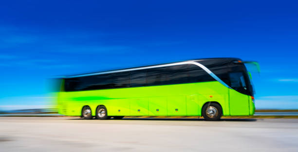 coach bus on the highway - bus coach bus travel red imagens e fotografias de stock
