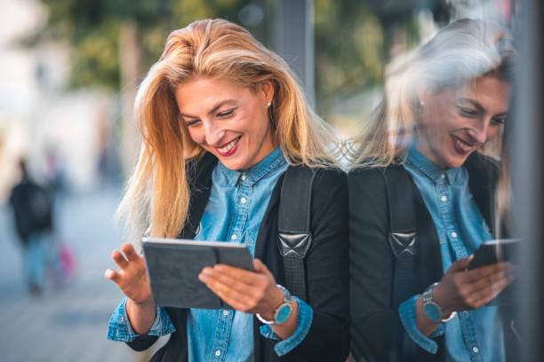istock Woman working outdoors in the city 1046139690