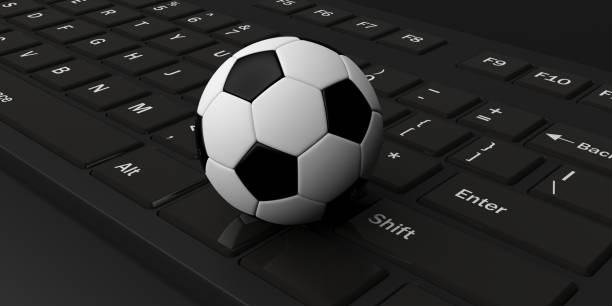 istock 3d rendering soccer ball on a keyboard 1046162162