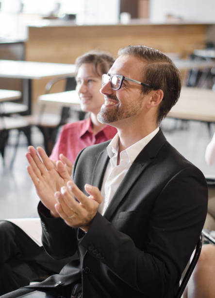 istock Large group of people applauding 1046162848