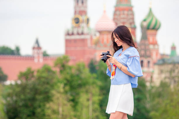 istock Professional photographer taking a city photo 1046168558