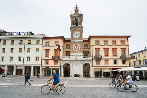 Ravenna, Italy – August 24, 2018: People with bikes on the streets of Ravenna