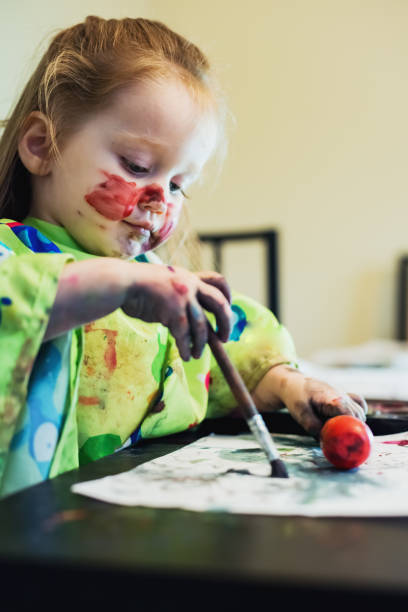 istock Girl Painting 1046202666
