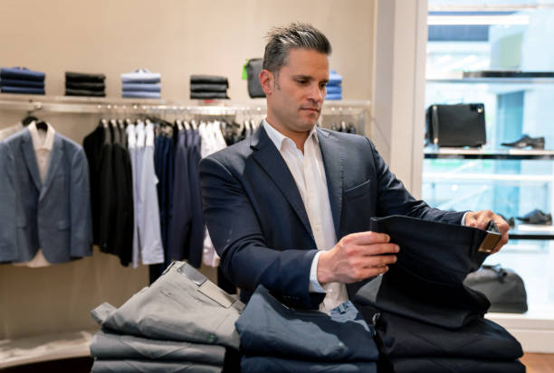 istock Business man buying formal clothes at a store 1046208228