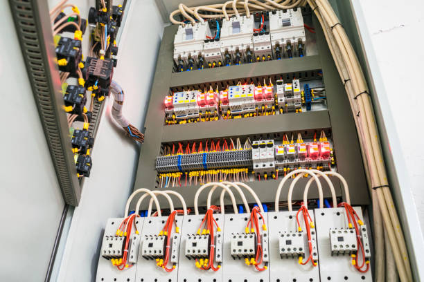 istock Electromagnetic high-current starters, voltage relays and sotal electrical equipment are installed in the fuse box. Electric cabinet with a set of wires and contacts 1046226778