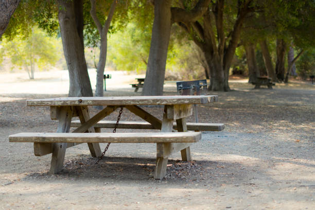 istock Table and chair with Charcoal Grill in the park 1046234500