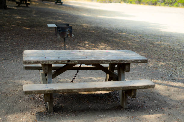 istock Table and chair with Charcoal Grill in the park 1046234502