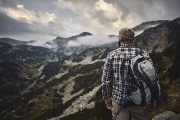 istock Traveling alone in the mountains at sunset 1046237570
