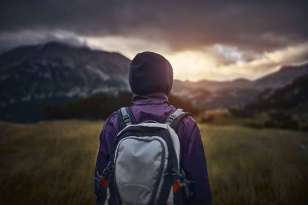 istock Traveling alone in the mountains at sunset 1046237668