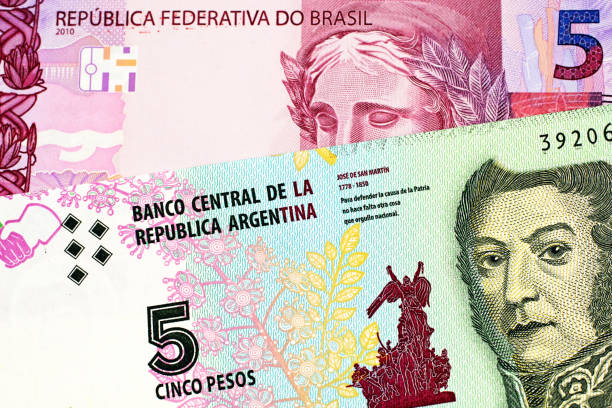 istock A five Argentinian peso bank note with a Brazilian five reais note 1046242676